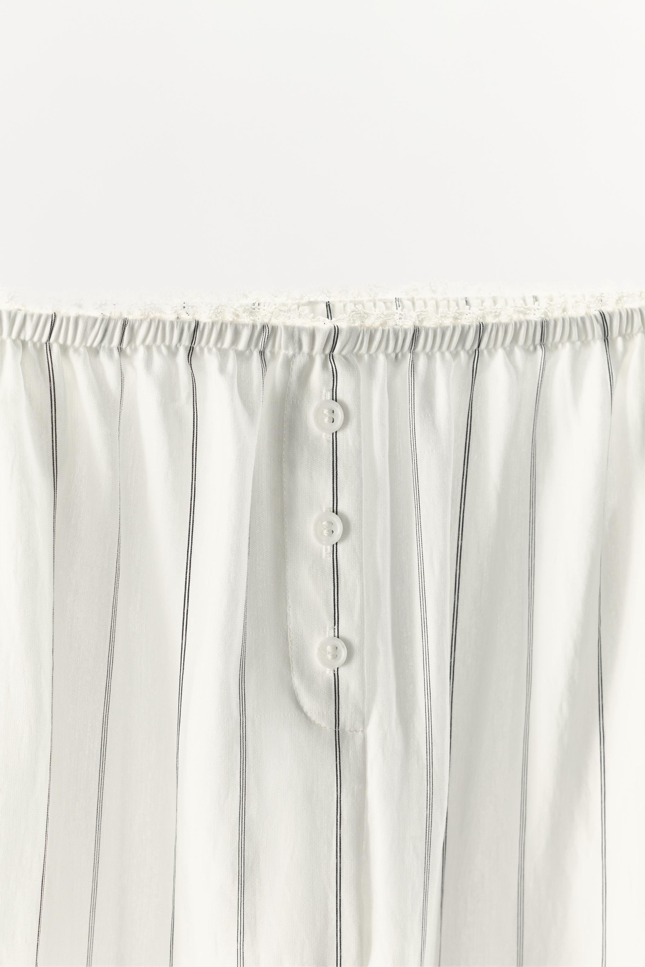 PANTALON À RAYURES ET DENTELLE